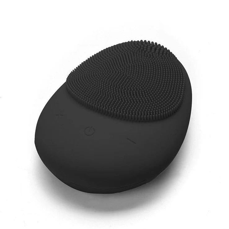 Silicone facial cleansing device with wireless charging base in multiple colours