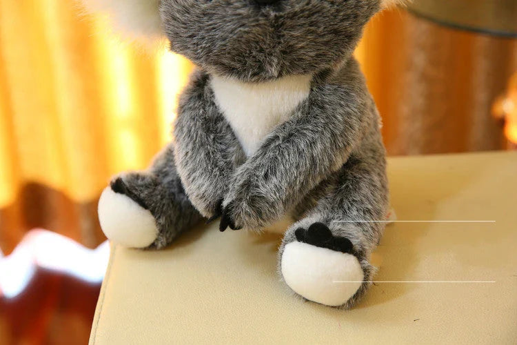 Soft plush koala doll with 100% PP cotton filling, available in 12cm, 16cm, 20cm, and 28cm sizes