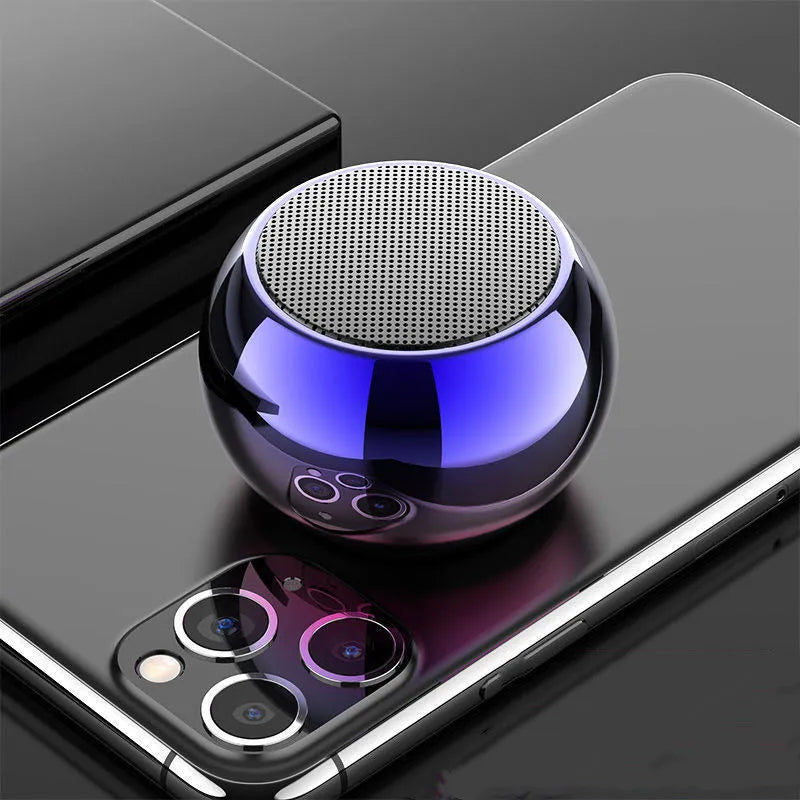 Mini portable metal Bluetooth speaker in gradient blue, light blue, orange, or silver colours