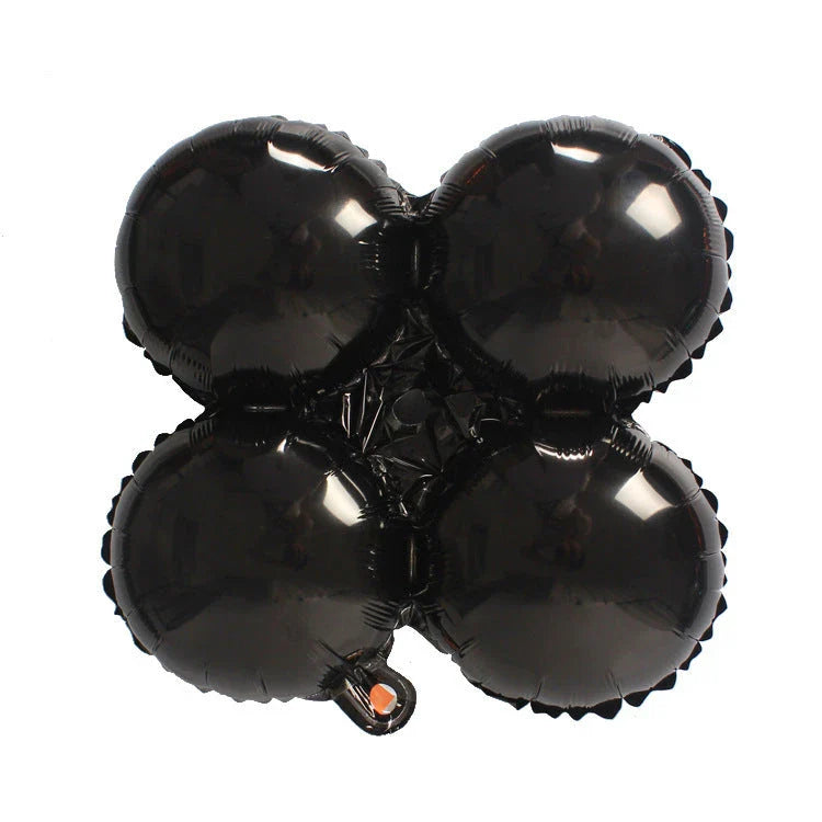 Helium-filled Halloween pumpkin balloons in various vibrant styles, perfect for decorating parties and homes