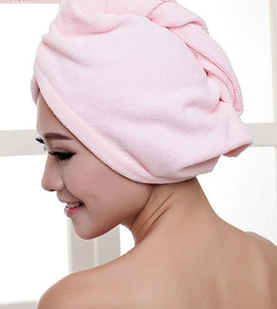 Absorbent microfiber hair turban in various vibrant colours, designed for fast and convenient drying