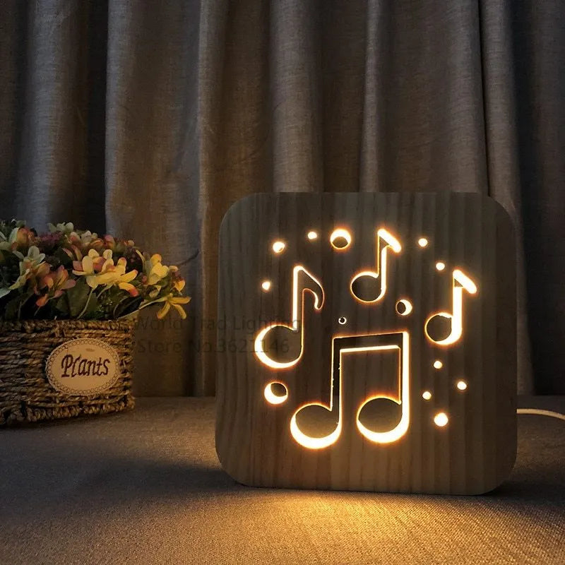 Square pine wood USB LED lamp emitting warm white light on a desk.