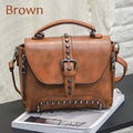 Vintage leather crossbody handbag with flap pocket and rivet detail in brown, size 25x20x12cm