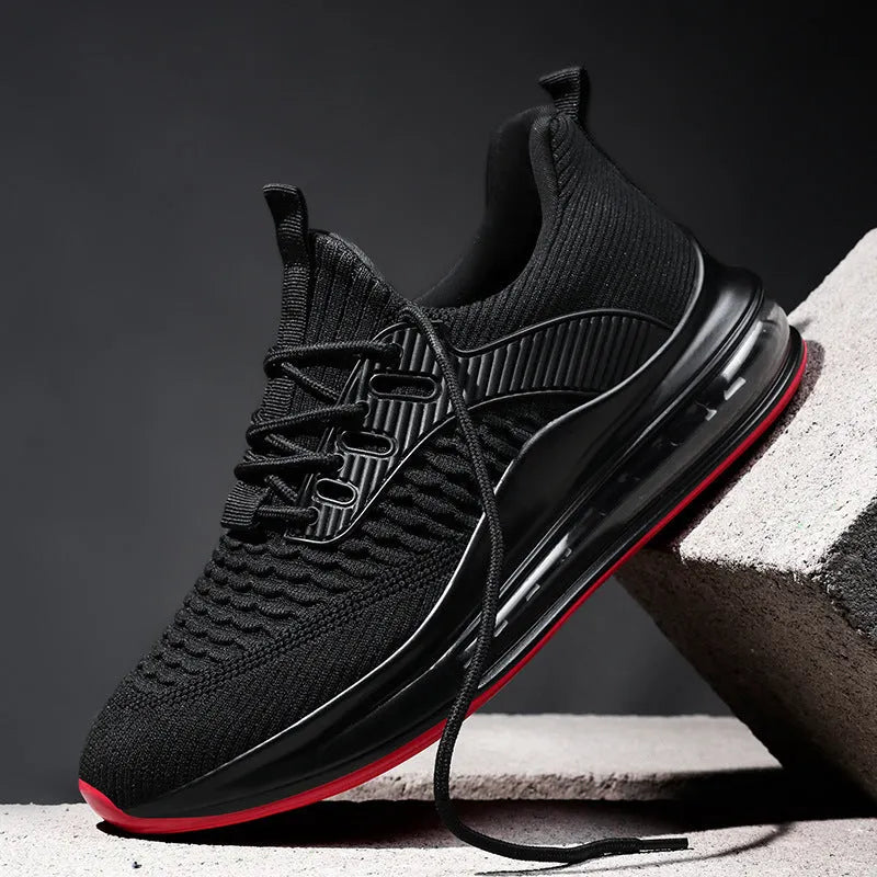 Men's black mesh running shoes with rubber sole and lace-up design for sports