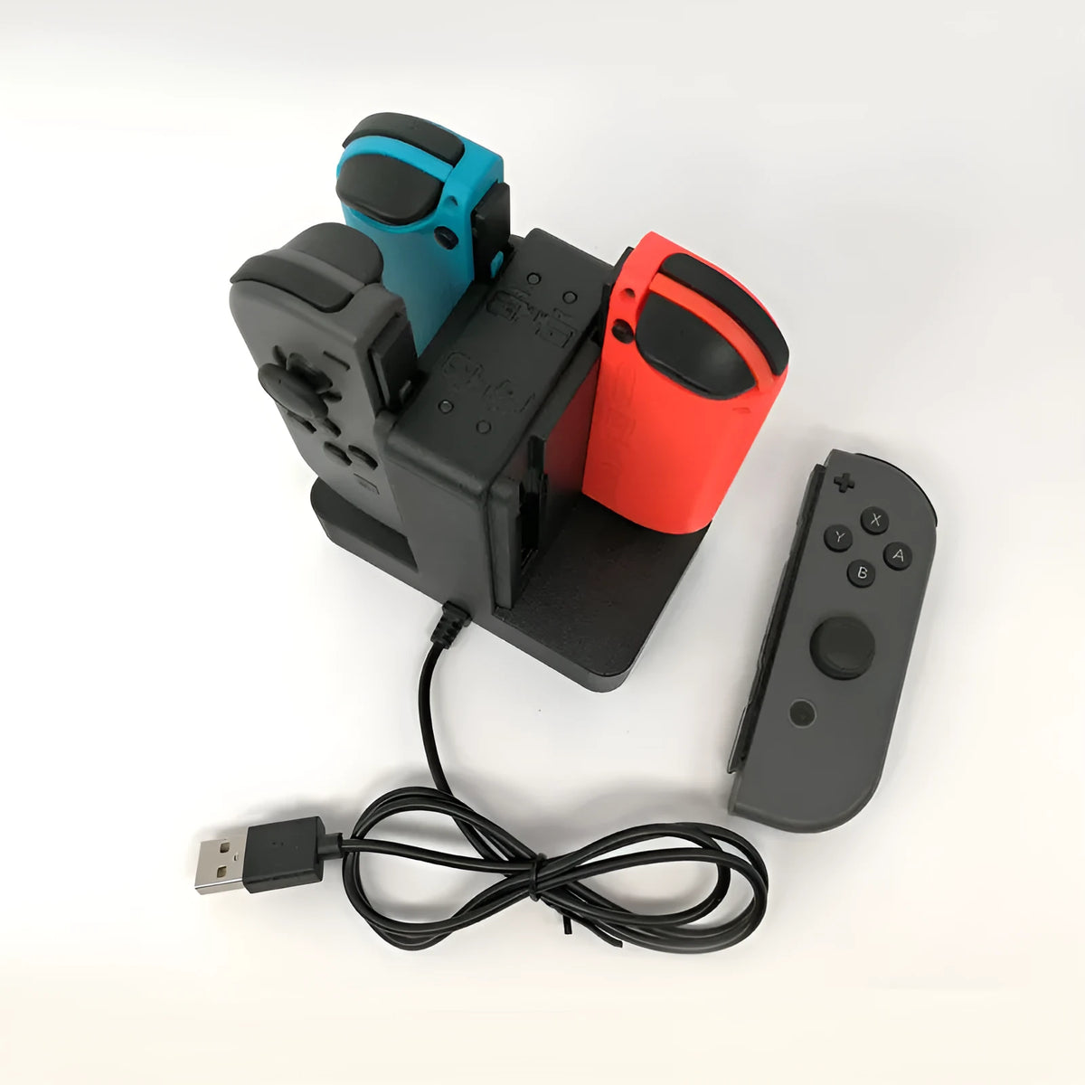 Black dual controller charging cradle with USB interface for left and right game handles