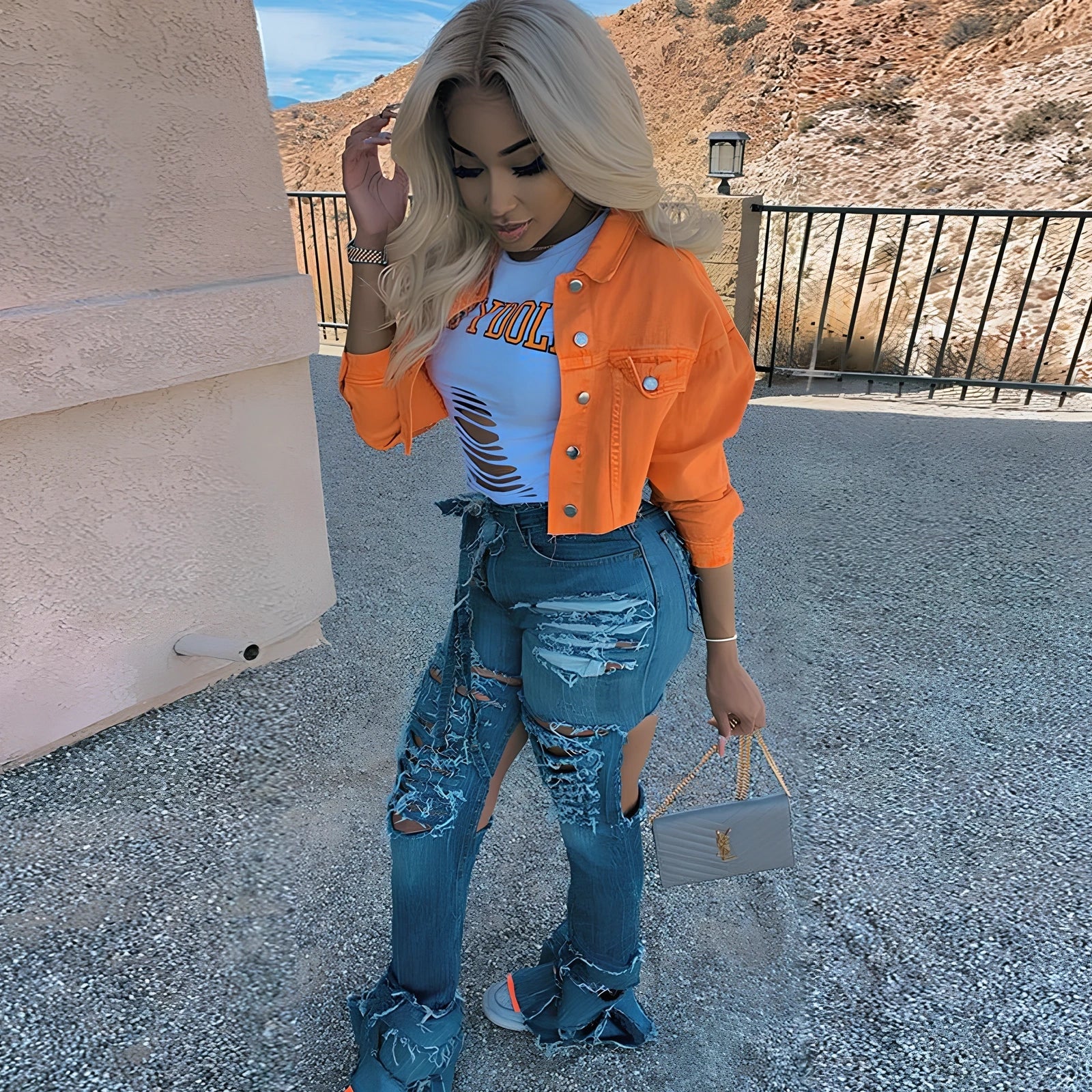 Orange cropped women's denim jacket with lapel collar, long sleeves 46cm, pockets, length 41cm, 0.35kg weight