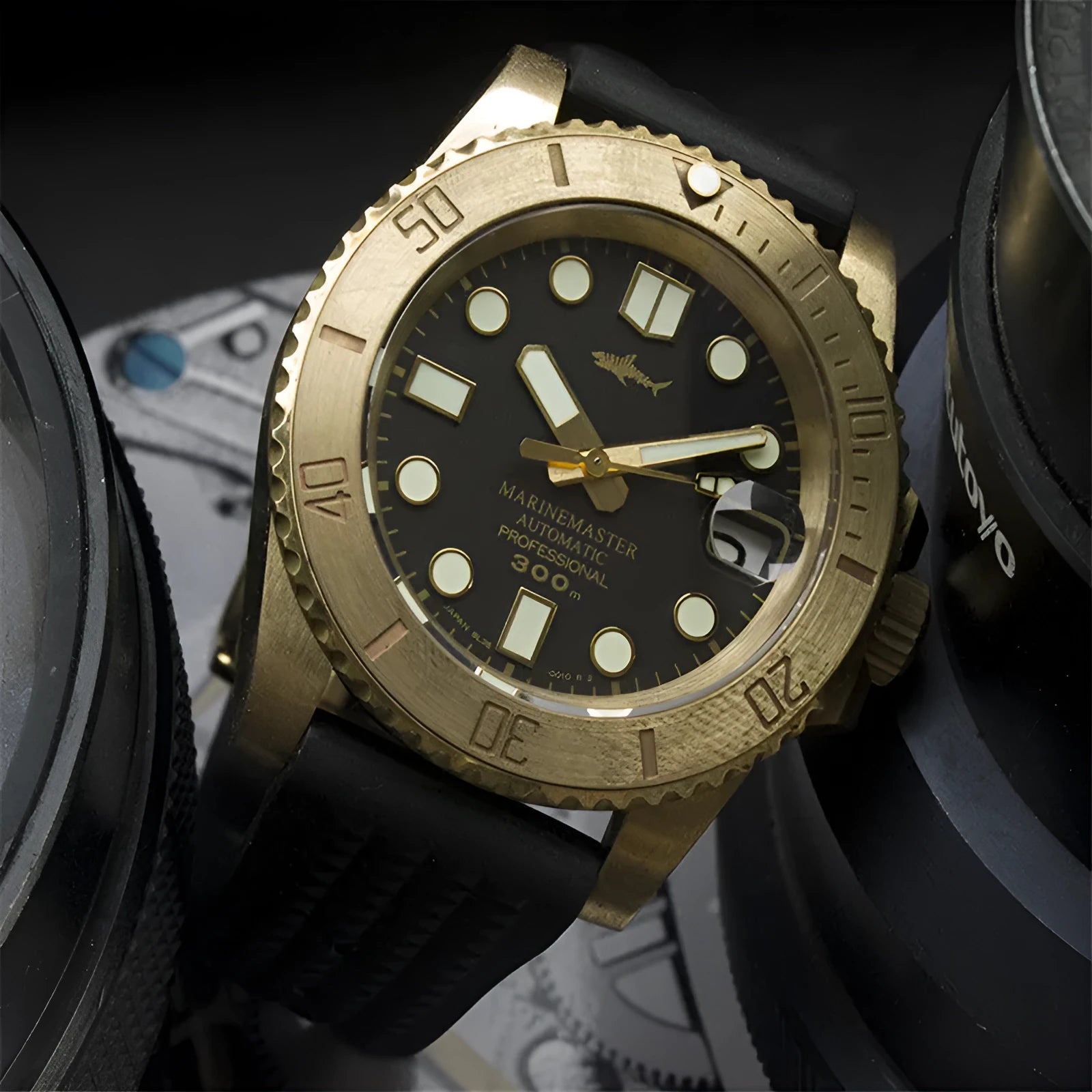 Men's vintage bronze automatic diving watch with gold dial and genuine leather strap on a wooden surface