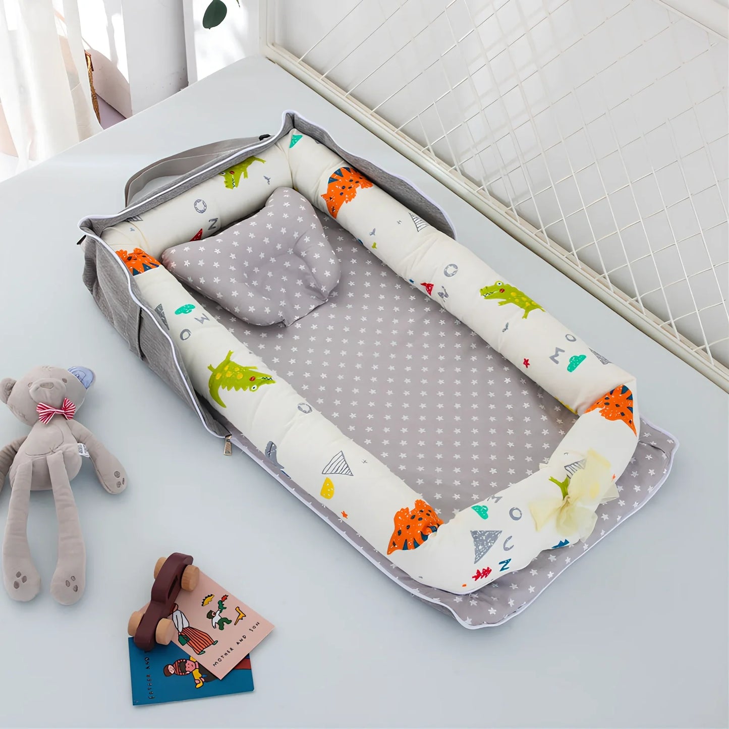 Foldable cotton portable baby crib in Animal World Blue, 90x50 cm with pillow and strap, weighing 1.3 kg