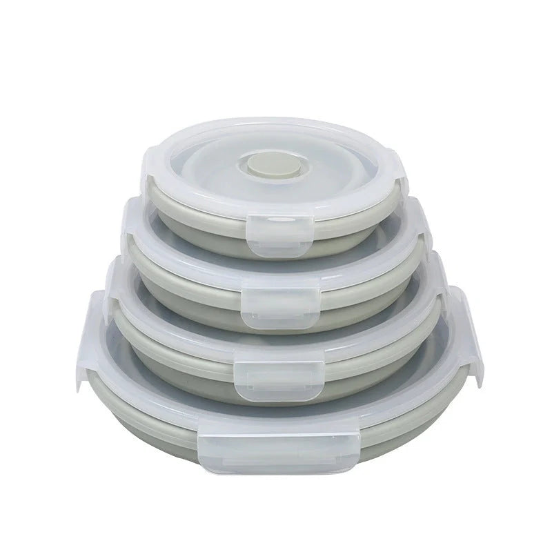 Round silicone lunch box in various colours, microwave-safe and leak-proof