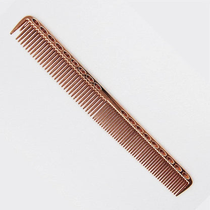 Space aluminium haircut comb in rose gold finish showing precise tooth spacing and polished metal surface