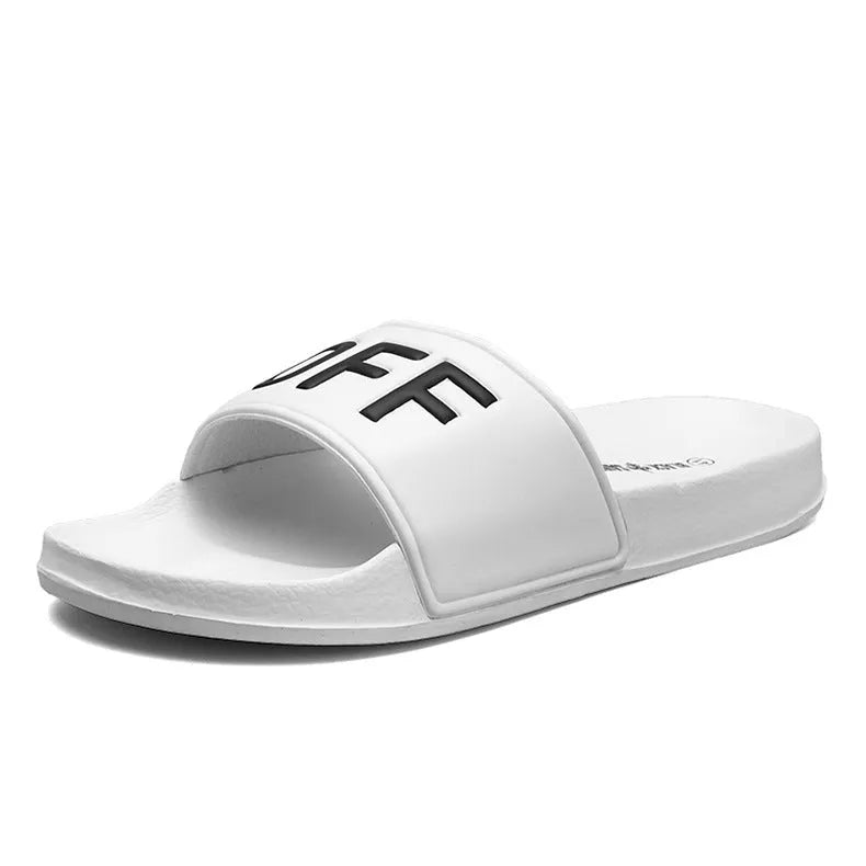 A pair of large men's open-toe slippers with a rubber sole, shown in black.