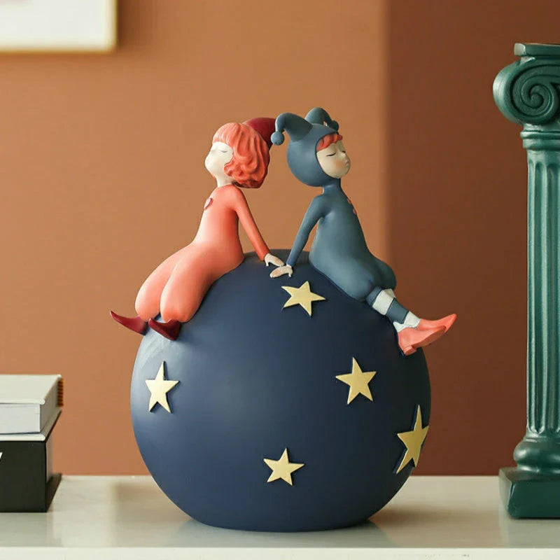 Hand-painted resin elf girl sculpture ornament with vibrant orange detailing