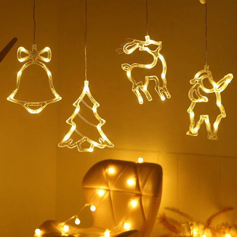 Festive LED Suction Cup Chandelier Lights with various holiday designs including snowmen, reindeer, and stars