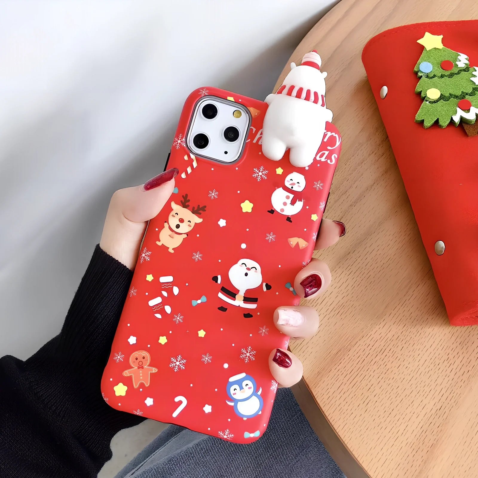 Christmas-themed silicone phone case with festive designs and 2mm protective thickness