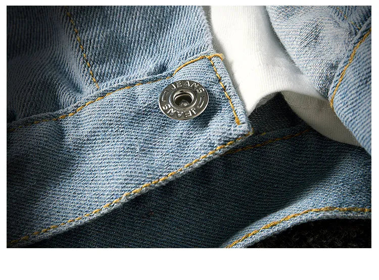 Men's blue denim jacket with lapel collar, single-breasted front, and side seam pockets on a model