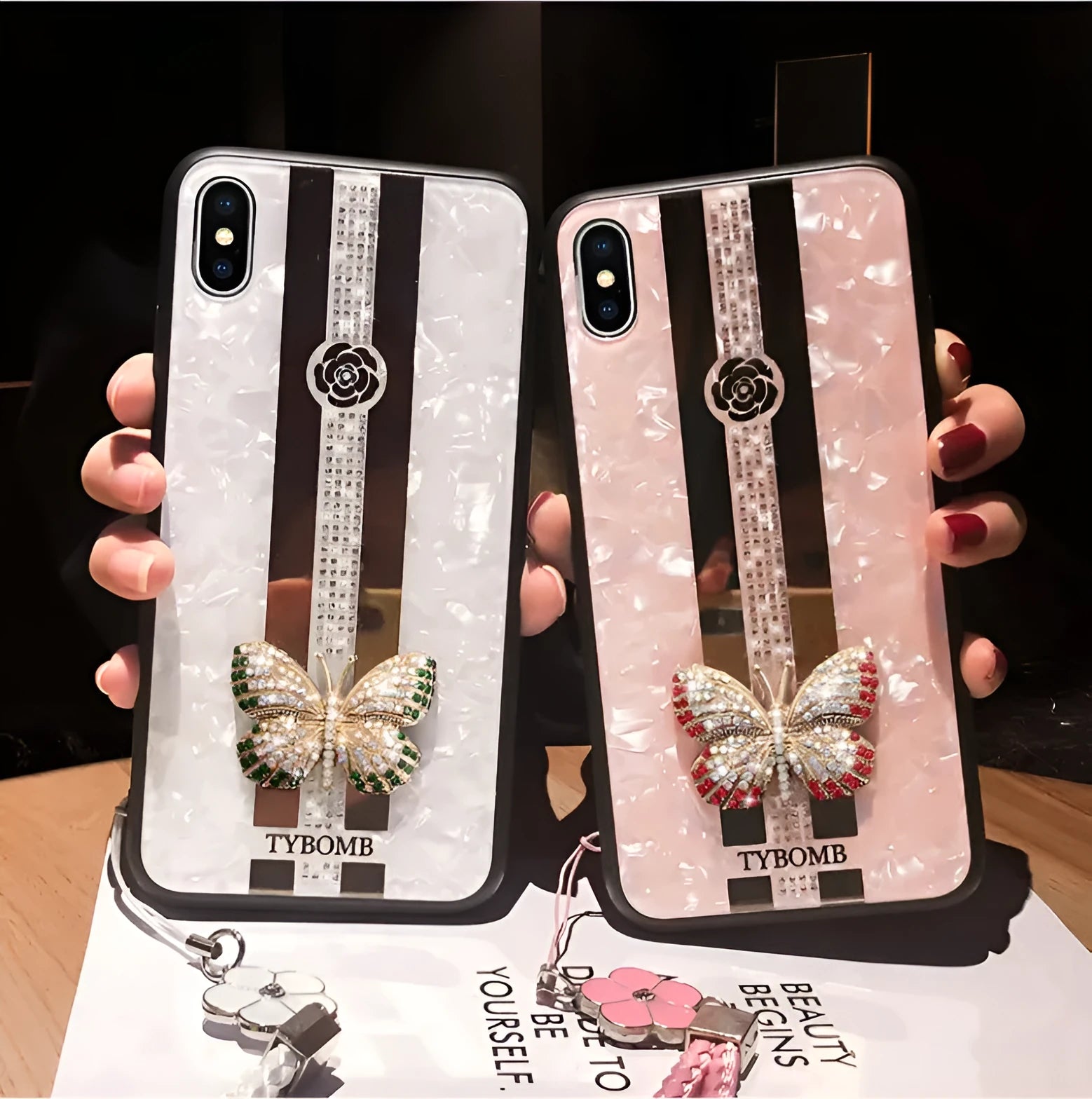 Acrylic iPhone case with butterfly diamond design and mirror in purple colour.