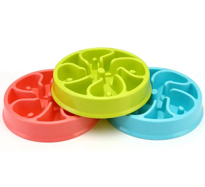 Anti-choke plastic dog bowl in pink, blue, green, and yellow