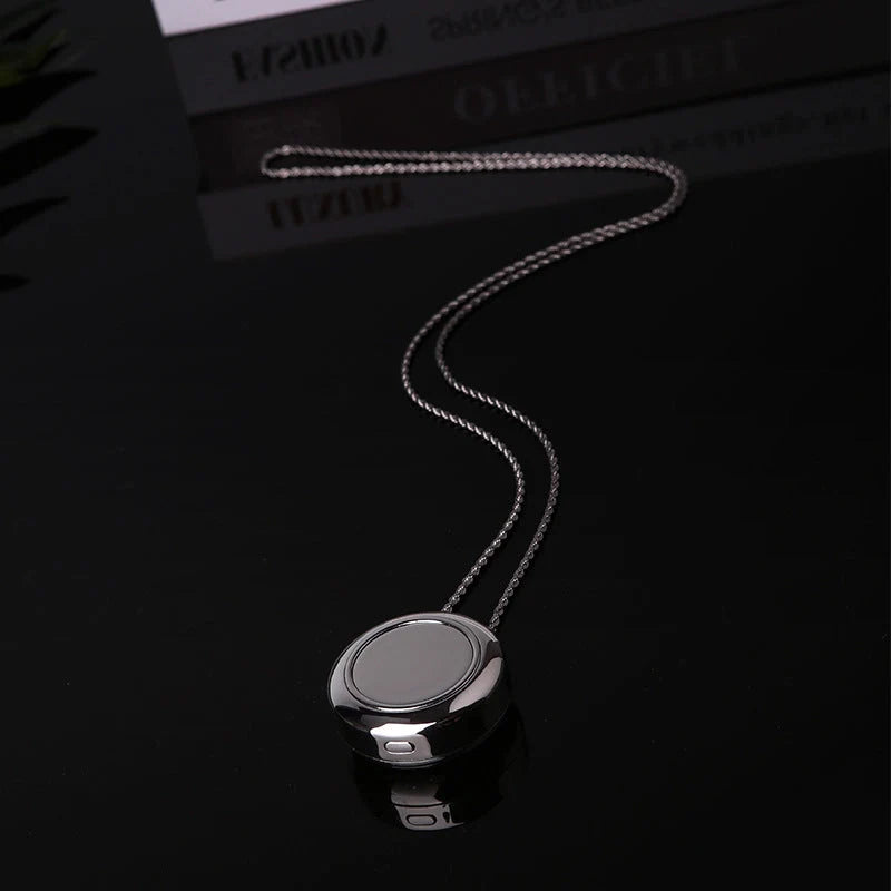 Portable negative ion air purifier necklace in blue, white, and silver options