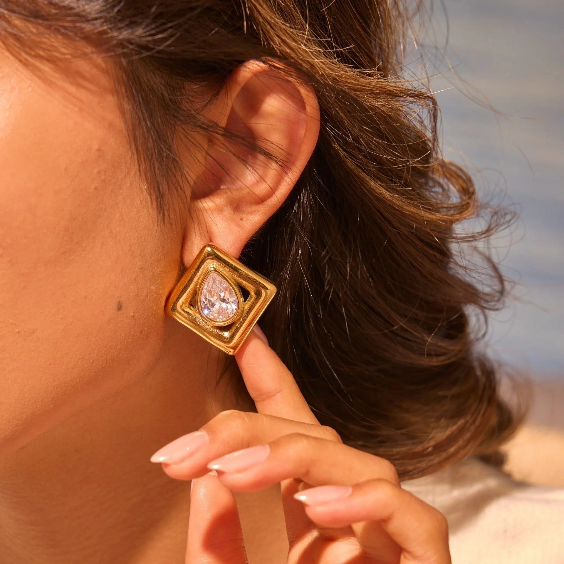 Gold geometric stud earrings with water drop zircon inlay on stainless steel