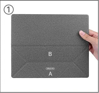 Blue foldable aluminium laptop cooling bracket open on a desk next to a laptop.