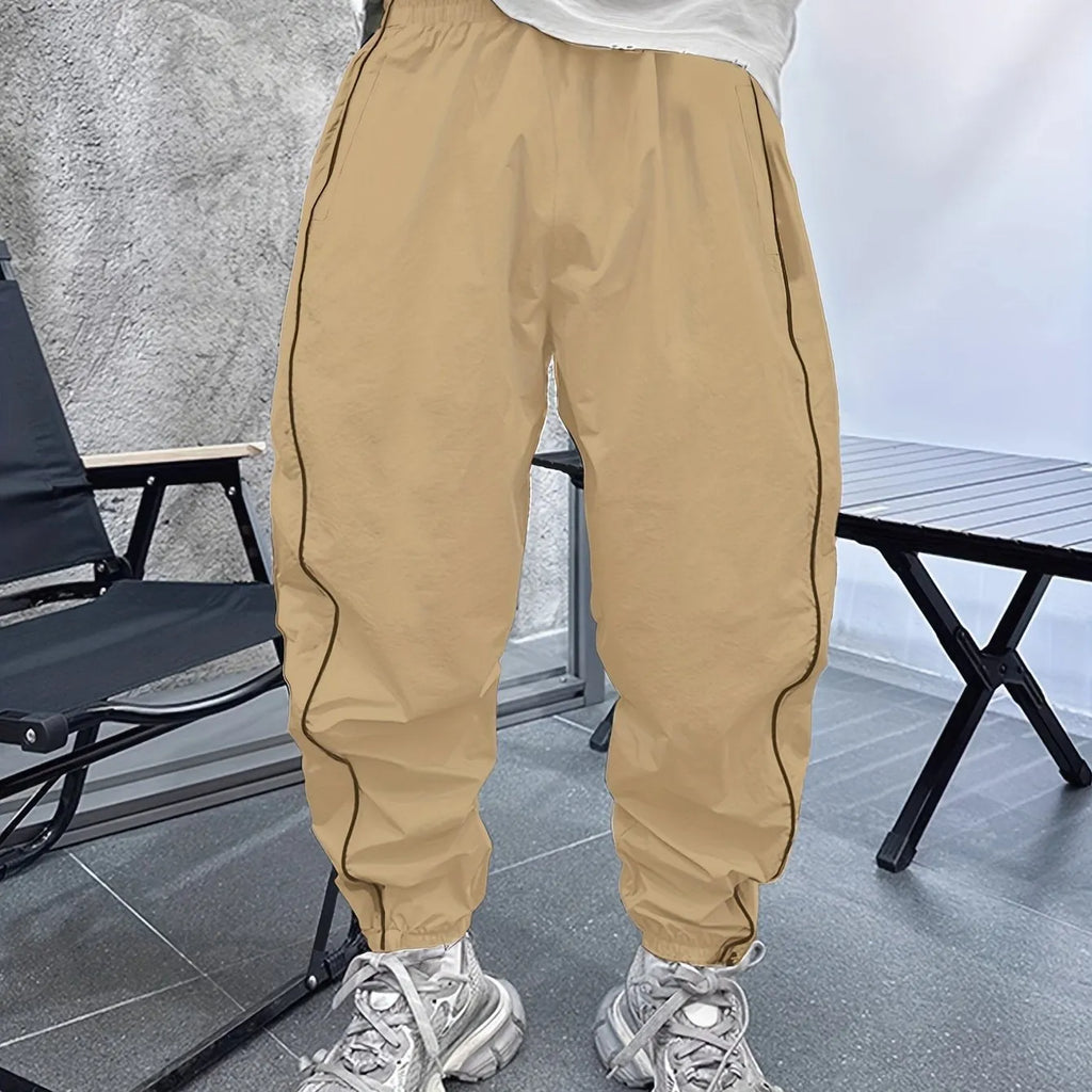 Men's loose fit cropped trousers in bamboo fibre, shown in army green colour.