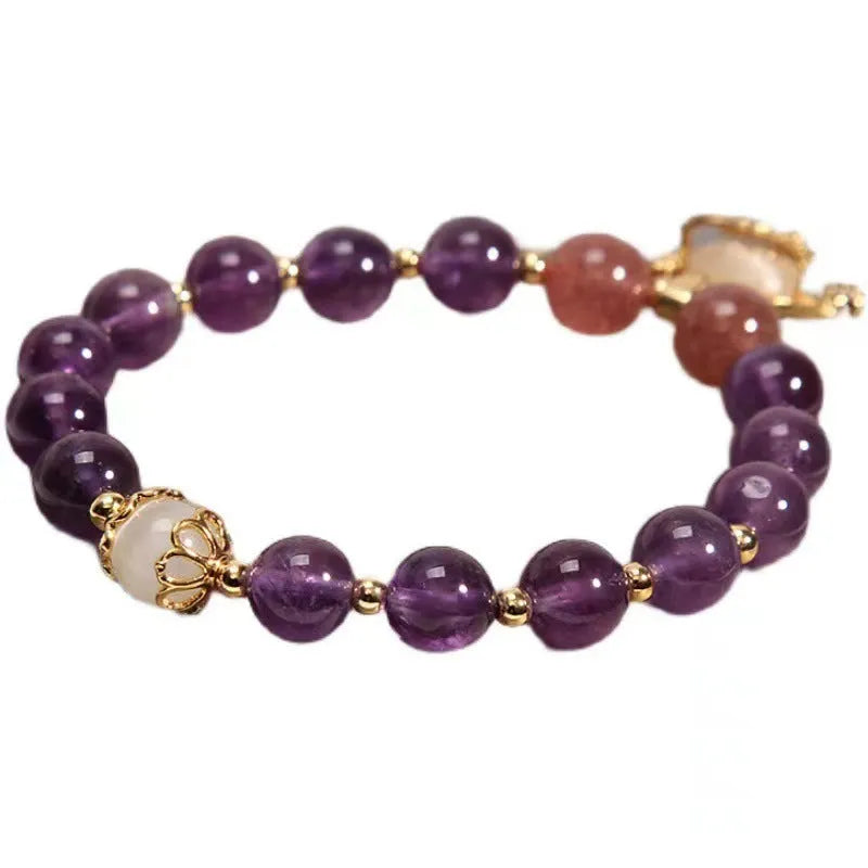 Handmade women's copper bracelet with natural amethyst crystal and gold longevity lock in retro style.