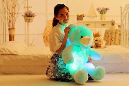 Colorful light-up plush teddy bear with over 7 changing LED colors, a cozy and unique Christmas gift for kids