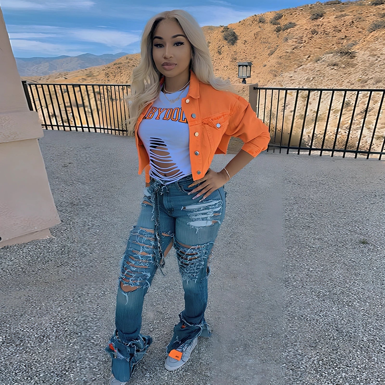 Orange cropped women's denim jacket with lapel collar, long sleeves 46cm, pockets, length 41cm, 0.35kg weight