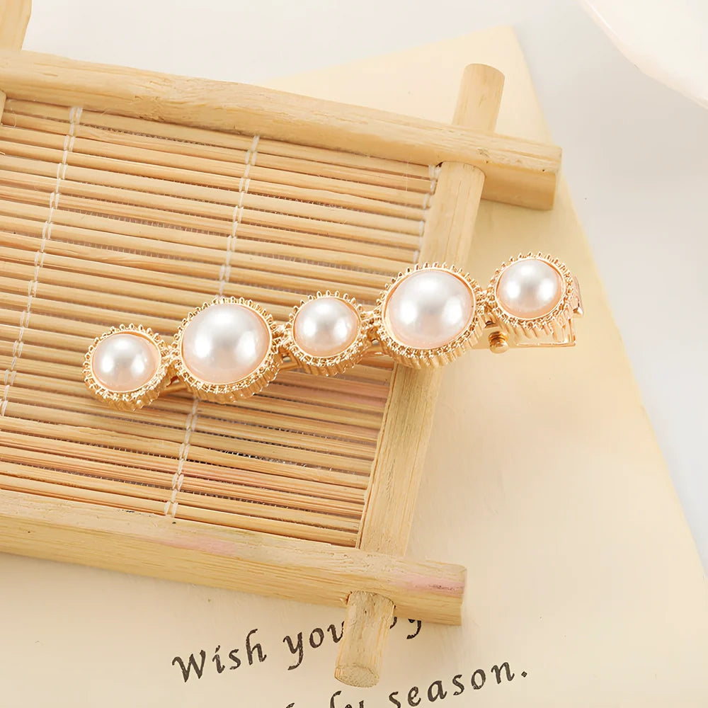 Slip-on pearl bow hair clip in alloy with flower at 2.4cm and pearls up to 7.2cm, secure grip design