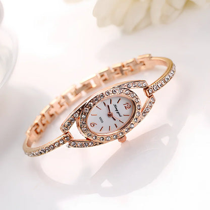 Silver-toned women's quartz bracelet watch with 25mm round dial, 185mm strap, and slim 7mm case for everyday wear