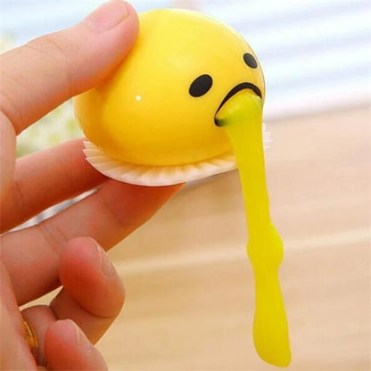 Gudetama Vomiting Egg Toy in green, orange, pink, and yellow