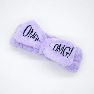 Coral velvet butterfly end hair band in pink with text styling, showing butterfly ends and cloth material