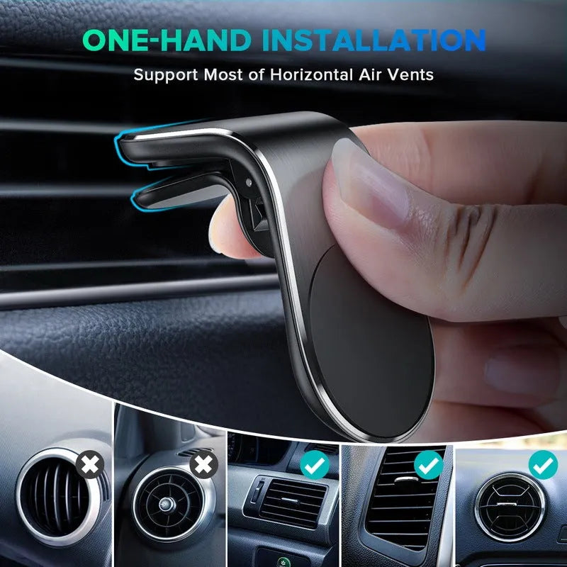 A black car bracket mounted in a vehicle dashboard outlet socket.