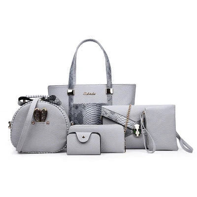 Elegant women's shoulder bag with zipper and organised pocket in light grey, black, off-white, and rose red