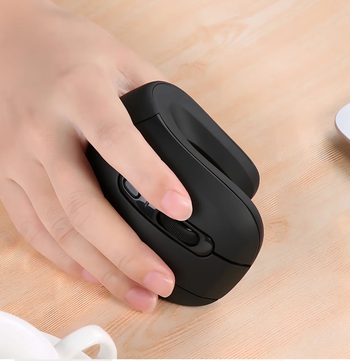 Black wireless vertical mouse with 6 buttons, ergonomic grip, and adjustable DPI display on desk surface