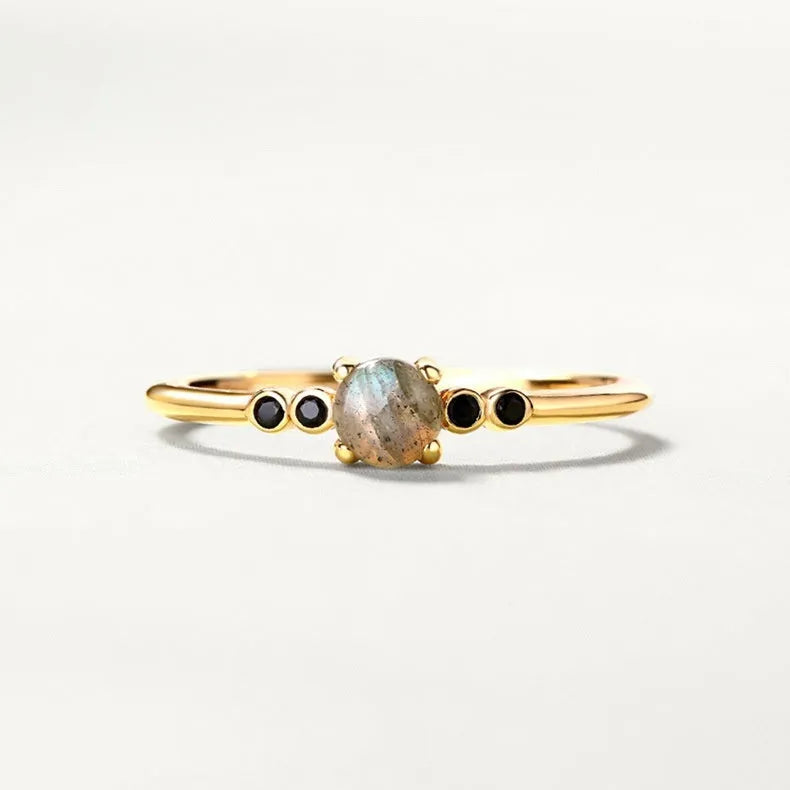 Gold coloured open ring with geometric round shape on silver base with electroplating