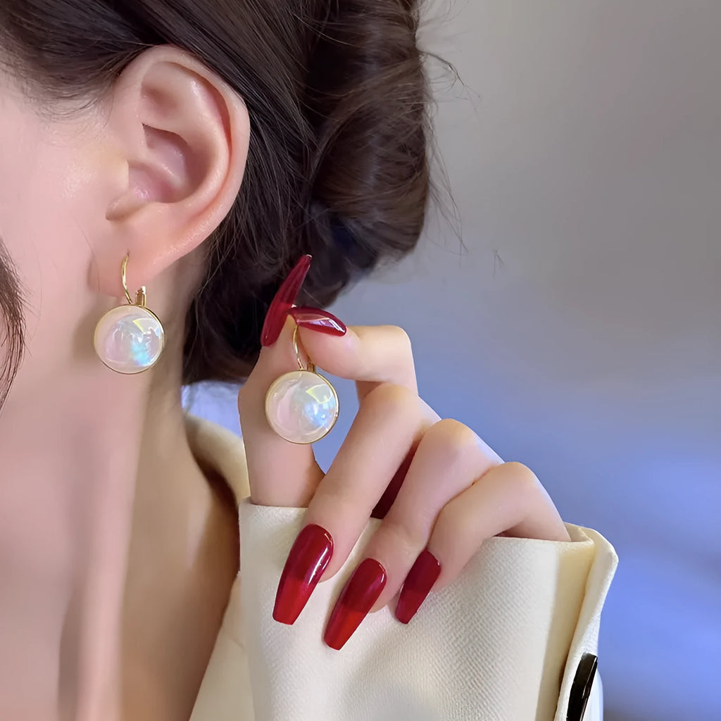 Colourful mermaid pearl finish geometric round ear clips with an anti-lost design for women.