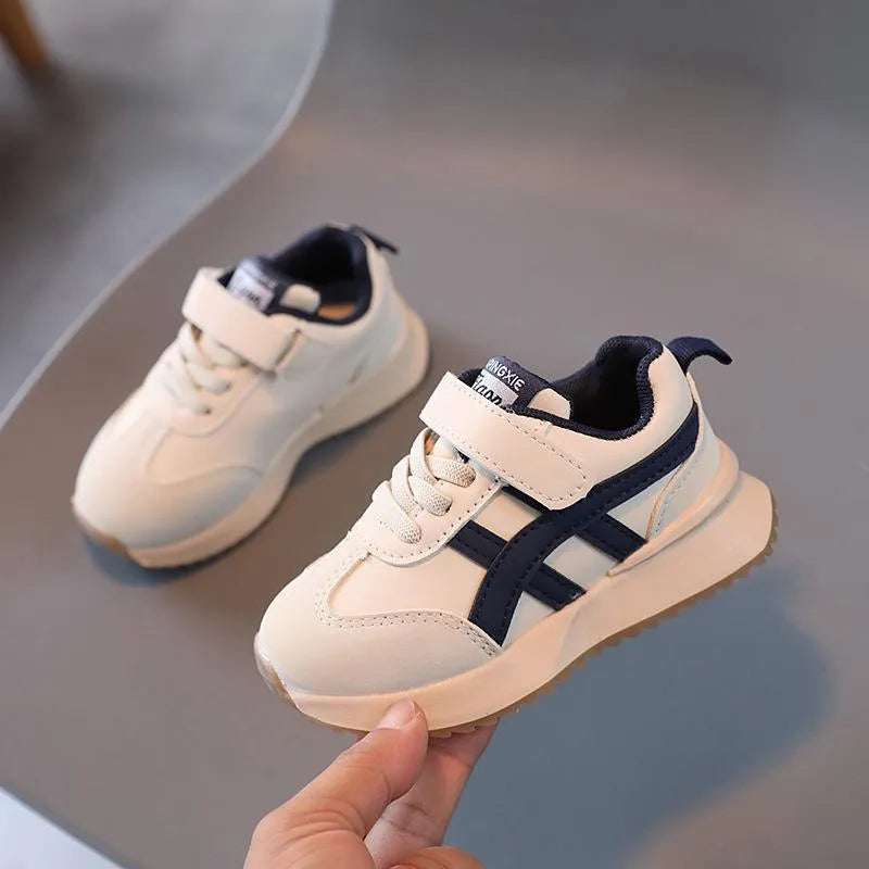 Children's white synthetic leather sneakers with Velcro closure and non-slip rubber soles