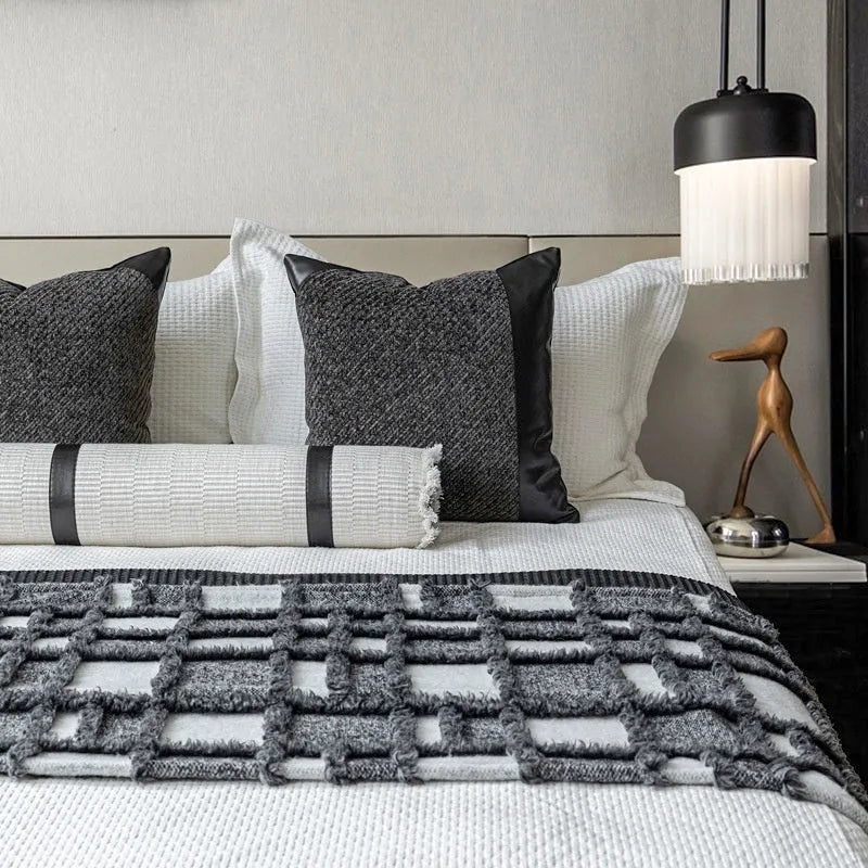 Modern grey and white plaid polyester bed runner set with leather pillow on a 1.8m bed