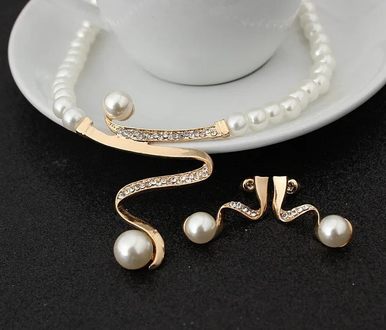 Gold electroplated pearl necklace and earrings set with deep V clavicle necklace design