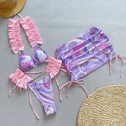 Women's purple pleated split bikini swimsuit with sleeveless design and briefs style for swimming