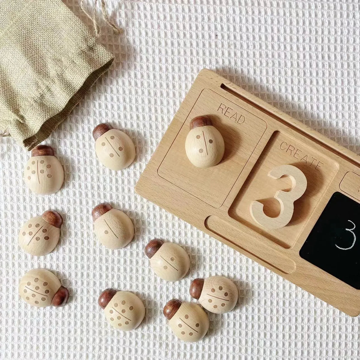 Beech wood ladybird digital teaching aid toy for children 4-6 years, with net pocket storage.