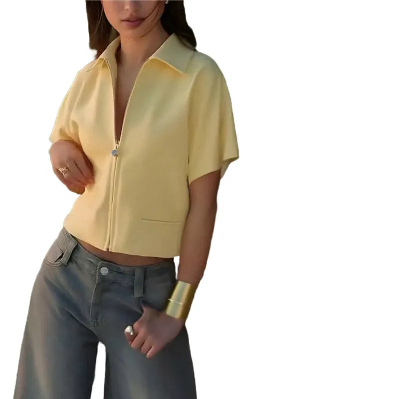 Damascus loose-fit short sleeve polyester top on a hanger in black, white, and yellow colour options.