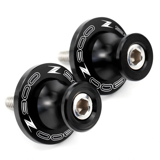 Pair of 8mm CNC aluminium swingarm spools sliders in titanium for Kawasaki Z650 Z900, with Delrin contact and stainless bolts