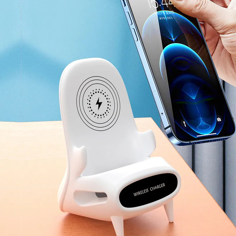 White mini chair shaped wireless charging stand for smartphones on desk