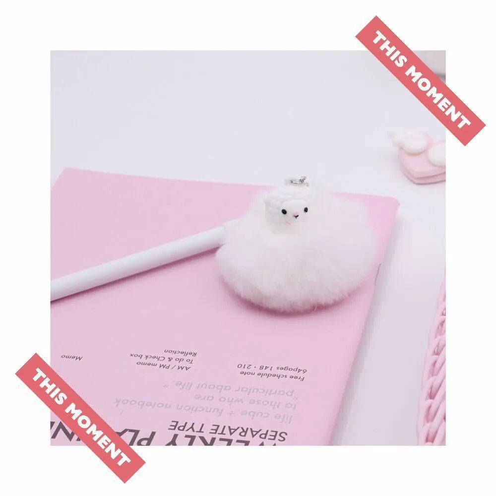 Alpaca hair ball charm pendant on a 17cm long 0.5mm tip neutral gel pen