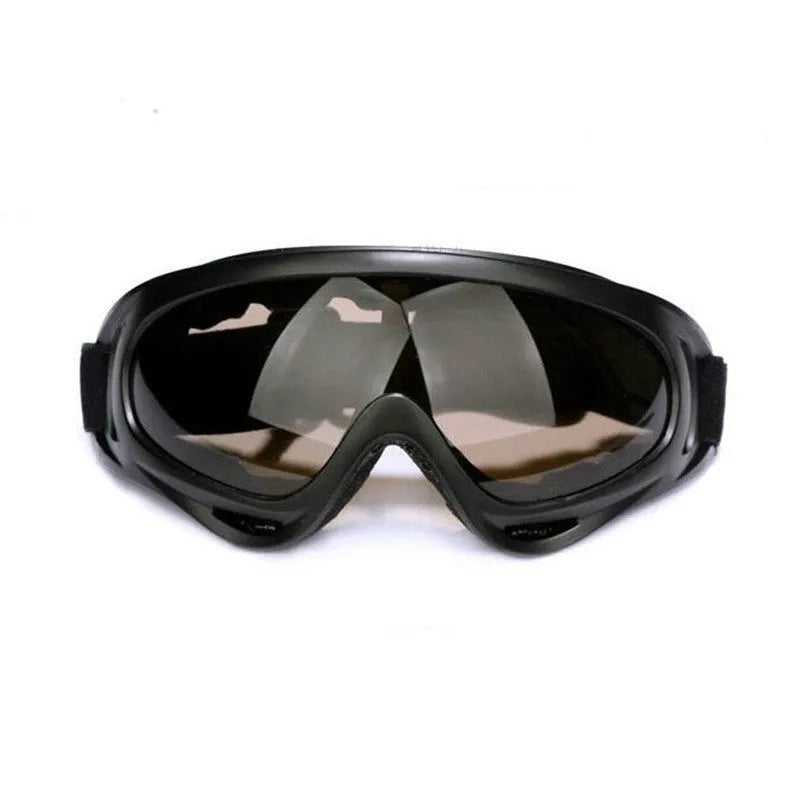 X400 motorcycle sand goggles with transparent PC lens on a rider wearing a helmet outdoors
