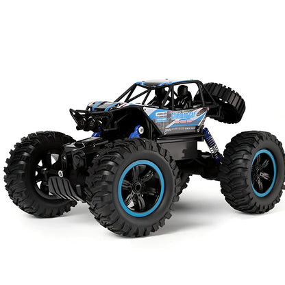 Blue 4WD remote control car with off-road tyres and 2.4GHz controller