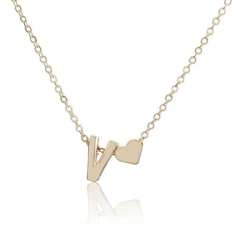 Heart-shaped letter pendant necklace with clavicle chain design in gold and silver tones