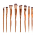 8-piece makeup brush set with nylon bristles, rose gold heart type handles, 22cm long, gold colour